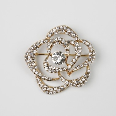 Gold and crystal flower brooch